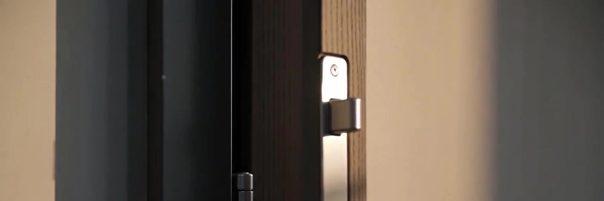 Locksmith checking a door lock, representative scene: Security bolts for reinforced doors